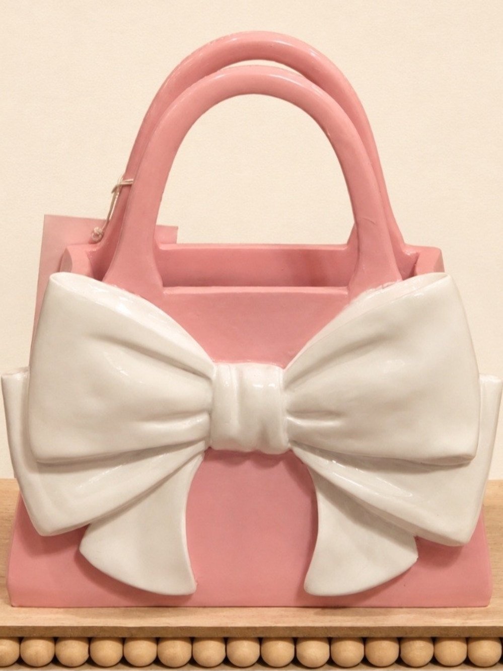 Pink Handbag with White Bow Accent